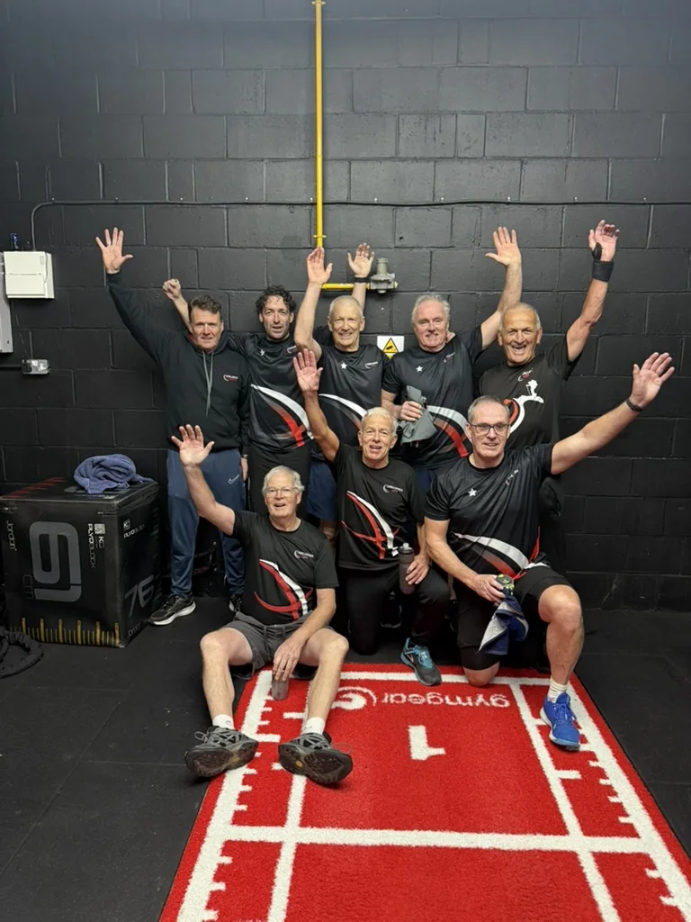 Challenge Life members celebrating together after a training session